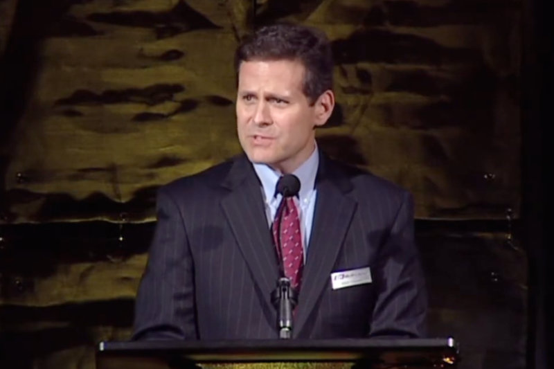 Michael J Cumbo delivering a speech